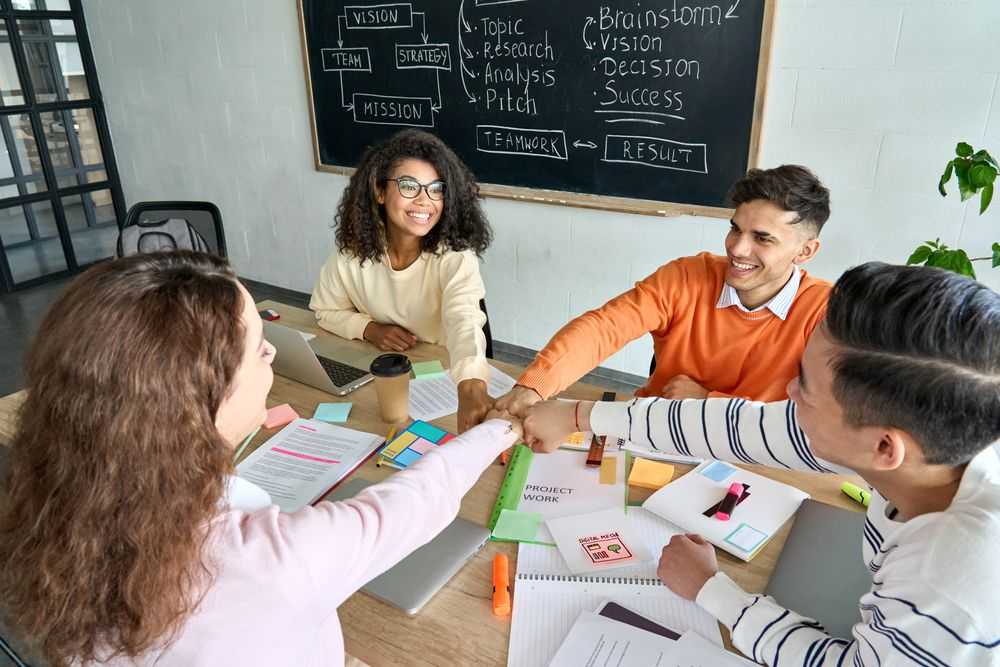 Students working in teams like a start-up